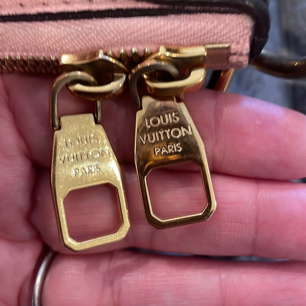Original LV leather/pink suede inside. Authenticity tags inside to verify.